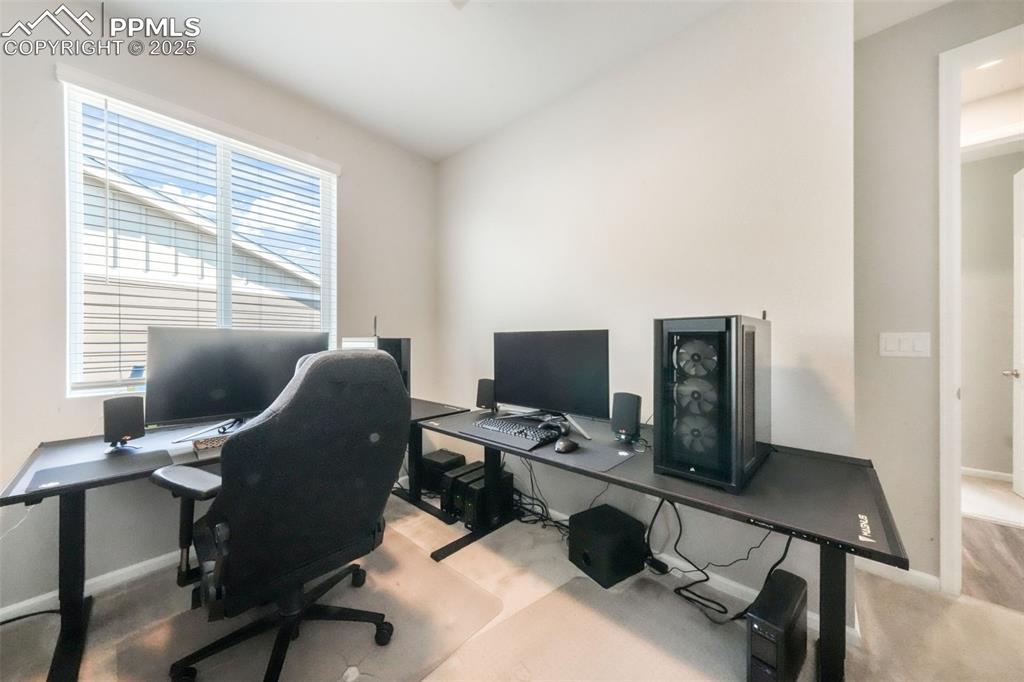 Image 5 of 47: 1st bedroom with carpet and large closet