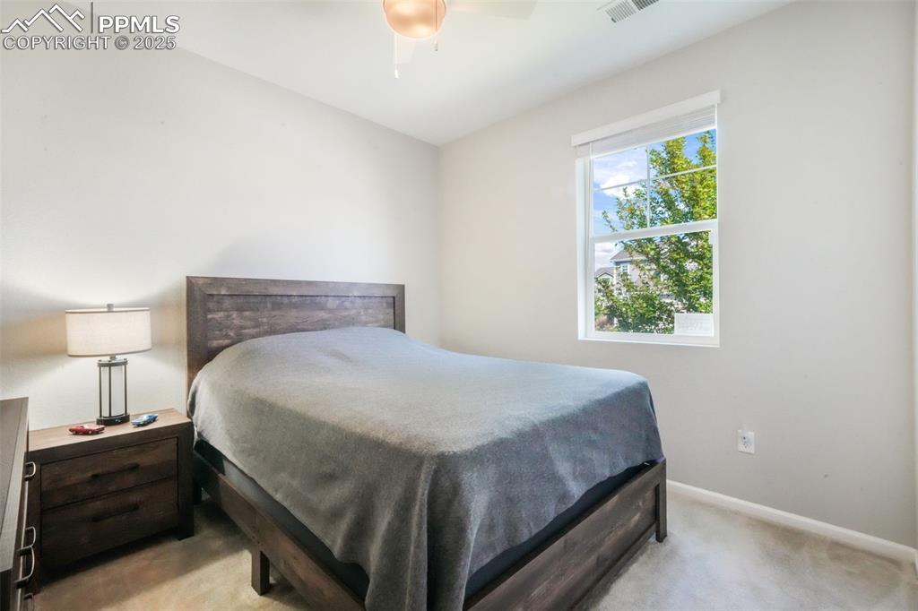 Image 8 of 47: 2nd bedroom with carpet and large closet