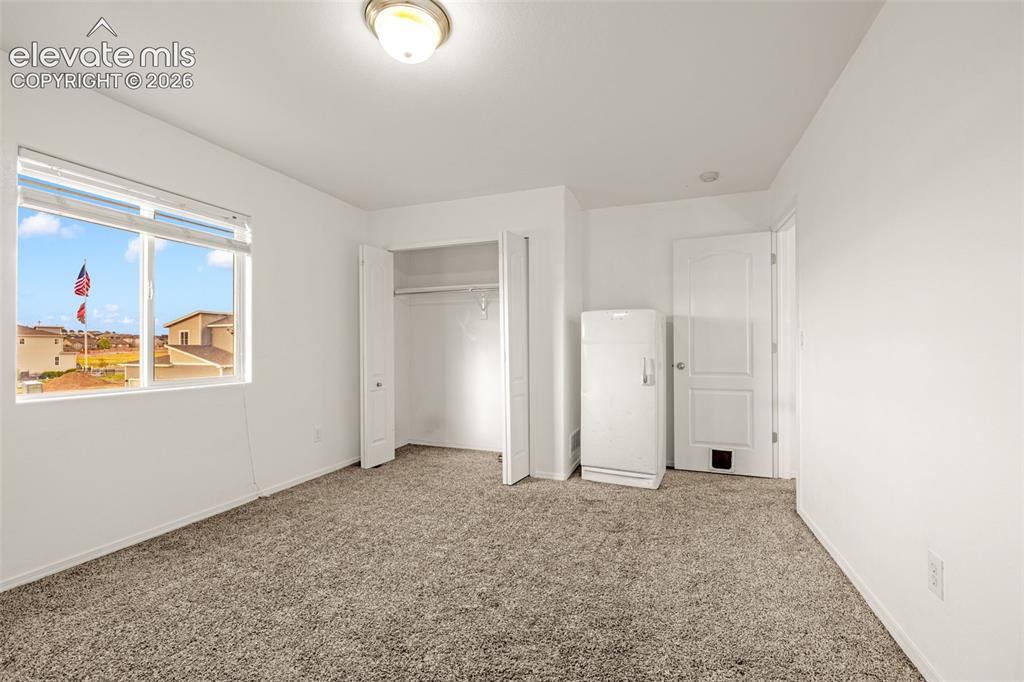 Image 18 of 31: Bedroom