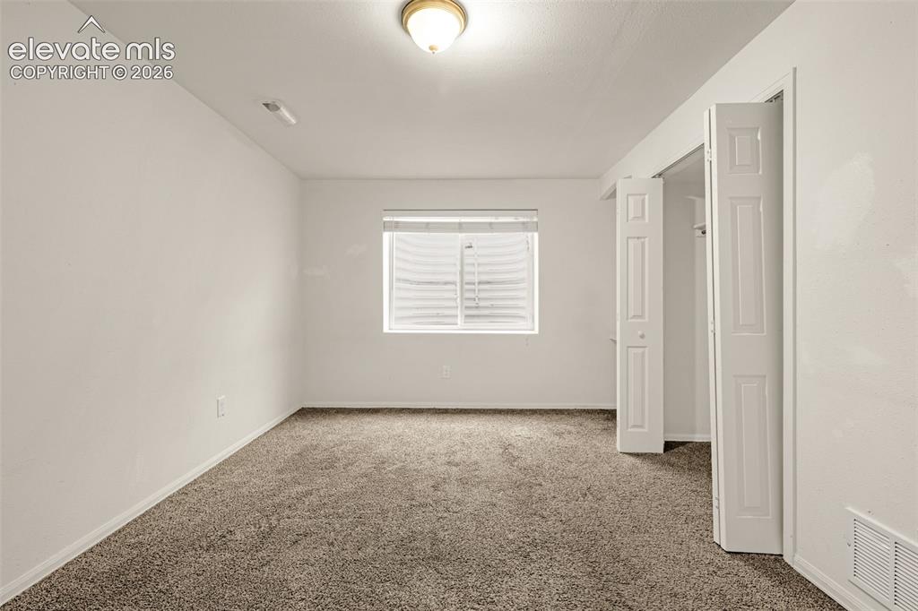 Image 23 of 31: Bedroom