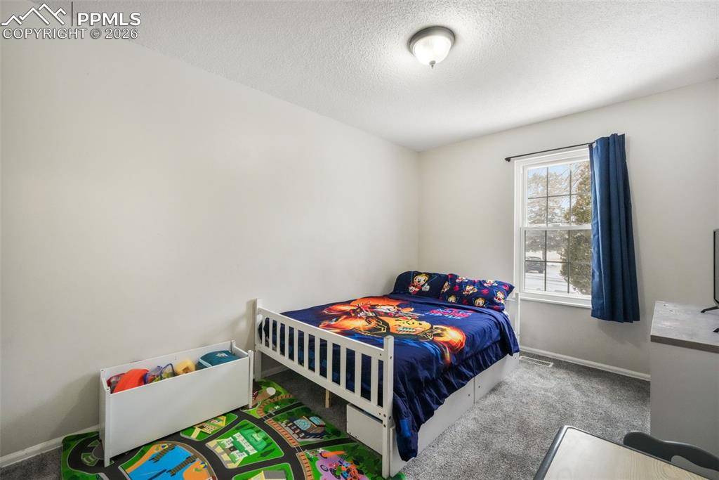 Image 36 of 50: Bedroom