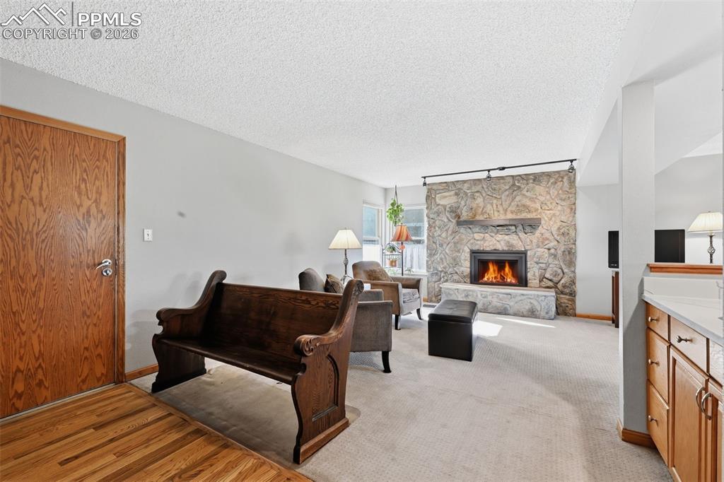 Image 13 of 49: Wet bar in family room is super convenient! Love the Gas Fireplace!