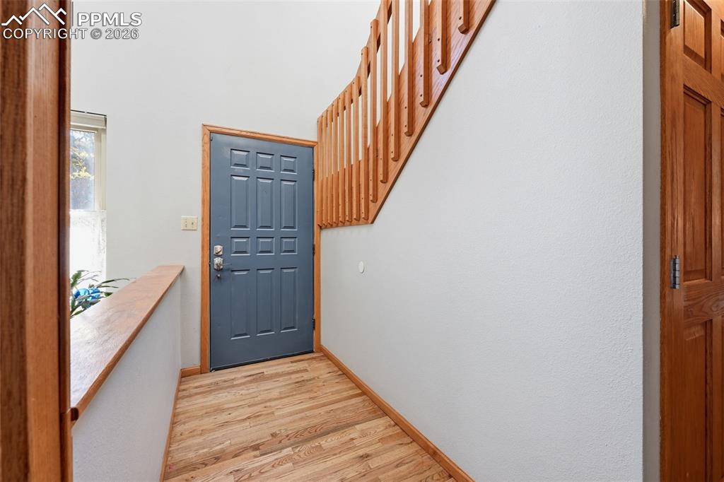 Image 4 of 49: Hardwood floors greet you when you enter!