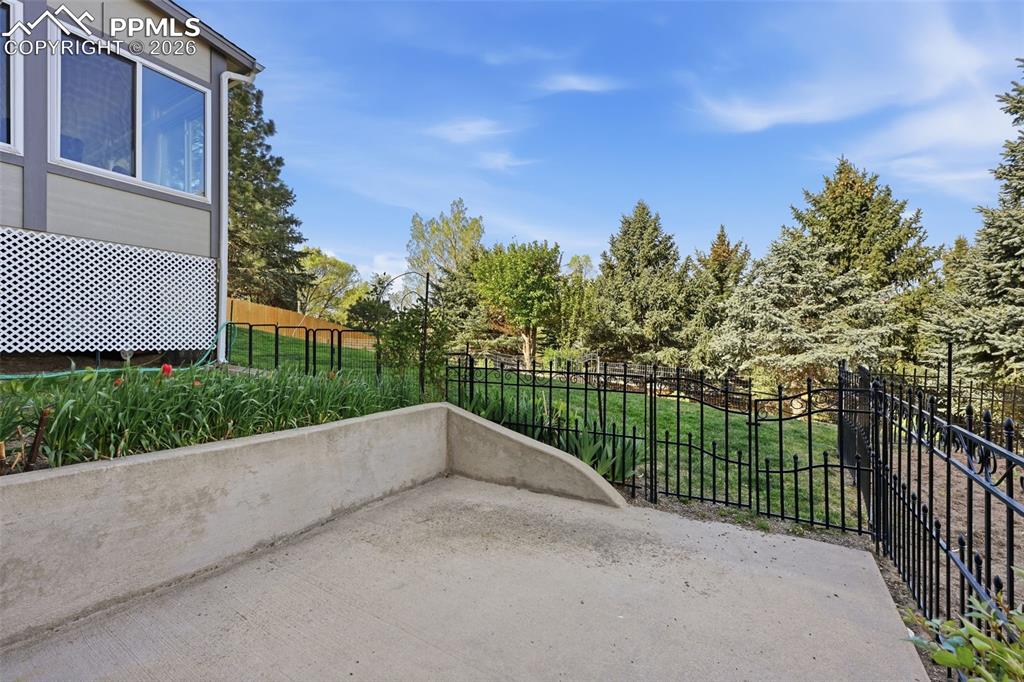 Image 47 of 49: This is the private patio that can be enjoyed by the Basement Apartment gue