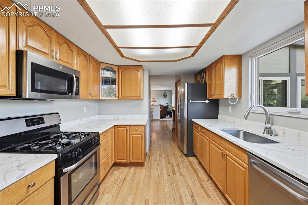 Image 9 of 49: The Gas Range and Stainless Steel Appliance are ready for the Chef in you!