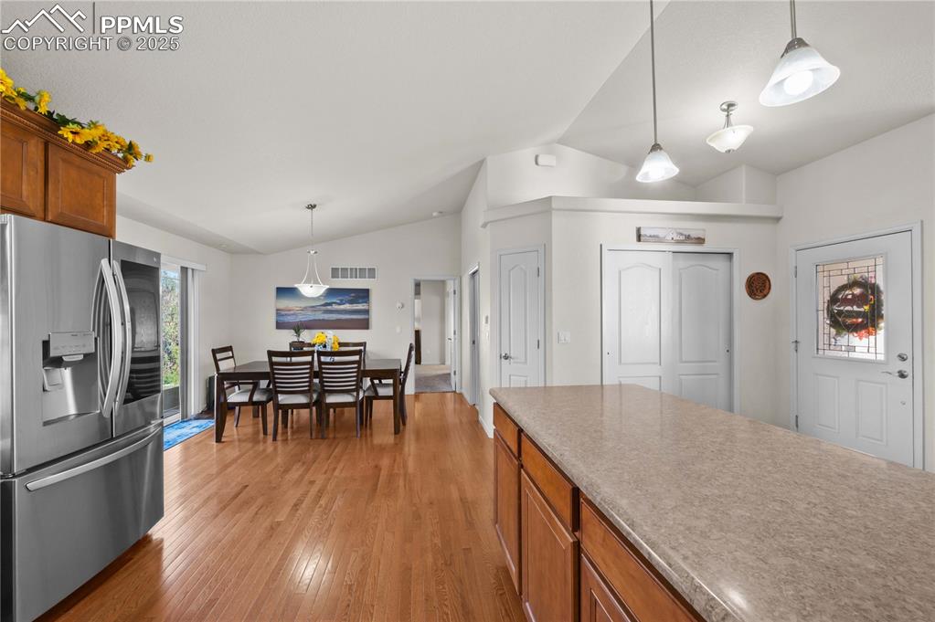 Image 10 of 35: Walkout to back patio from dining area / kitchen