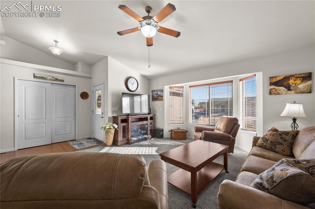Image 7 of 35: Coat closet and wood floors upon entry from the front door