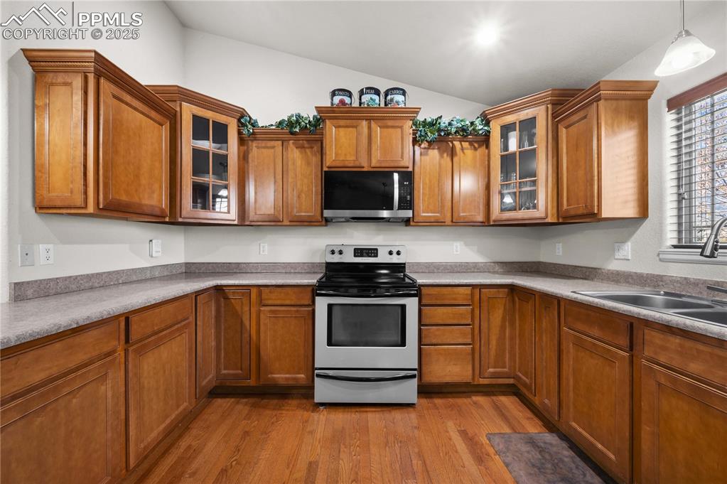 Image 9 of 35: Plenty of countertop space and storage in cupboards, plus a pantry