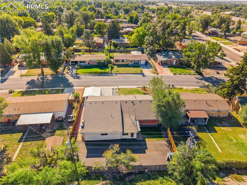 Image 30 of 31: Aerial view of residential area/ back of structure