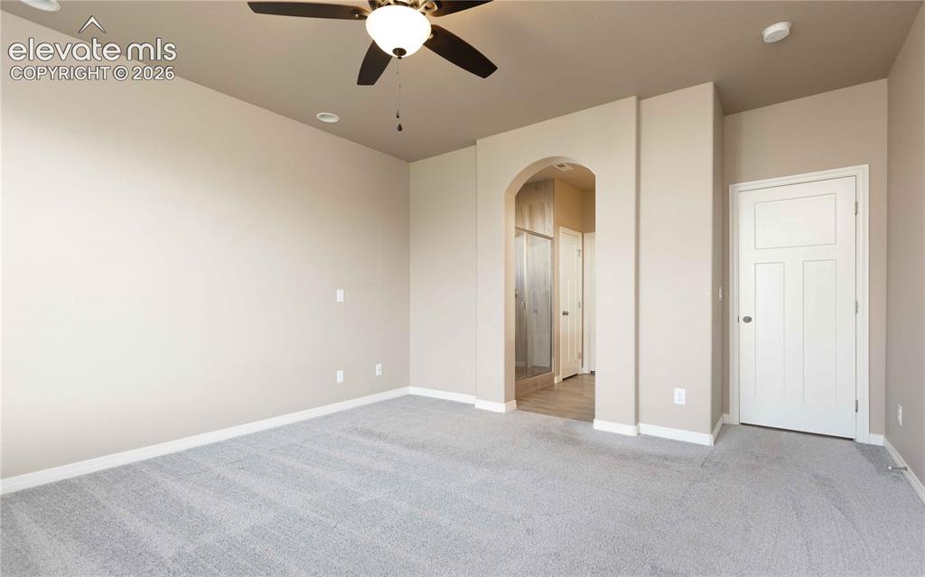 Image 18 of 40: Leads to the connected bathroom and walk in closet