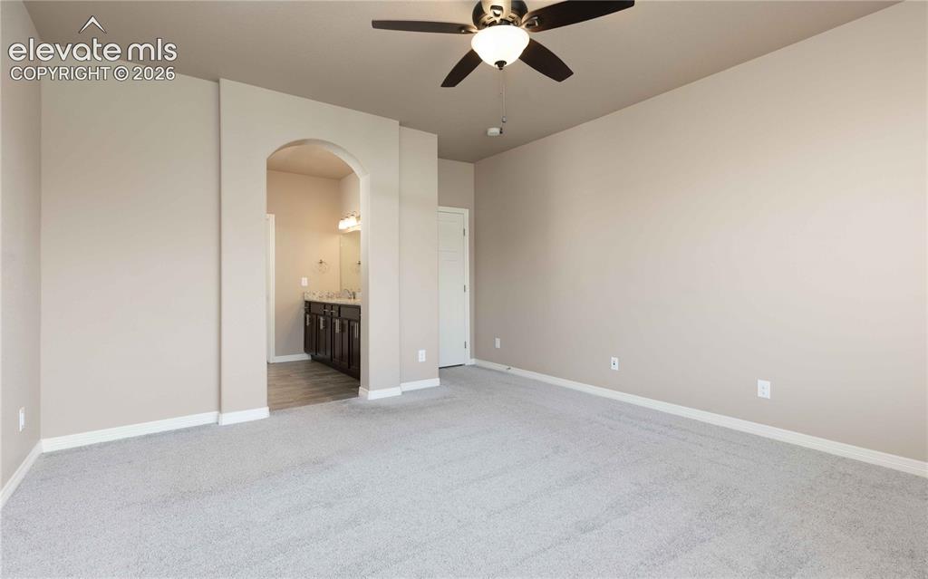 Image 19 of 40: Leads to the connected bathroom and walk in closet