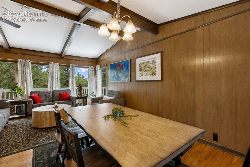 Image 8 of 32: Dining room and living room