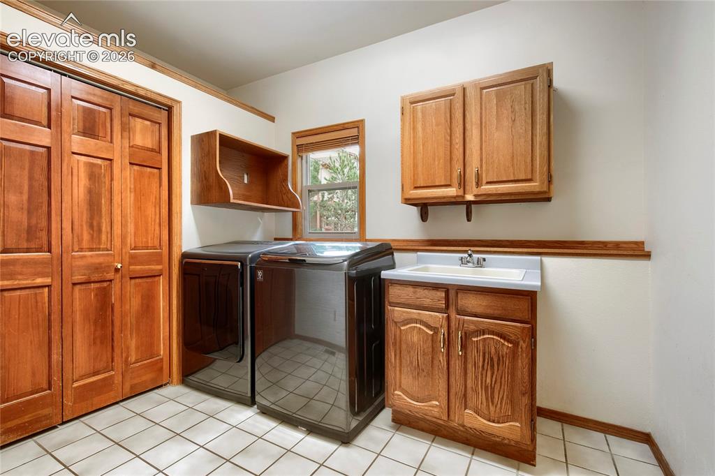 Image 19 of 49: Main Level Washer/Dryer!