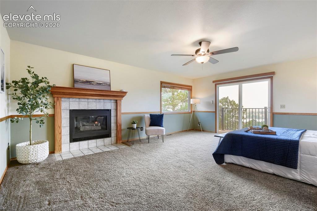 Image 20 of 49: Your Primary Retreat Has it ALL! Gas Fireplace..