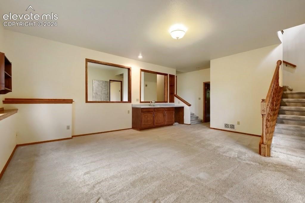 Image 31 of 49: Lower Level Living Space is Massive!