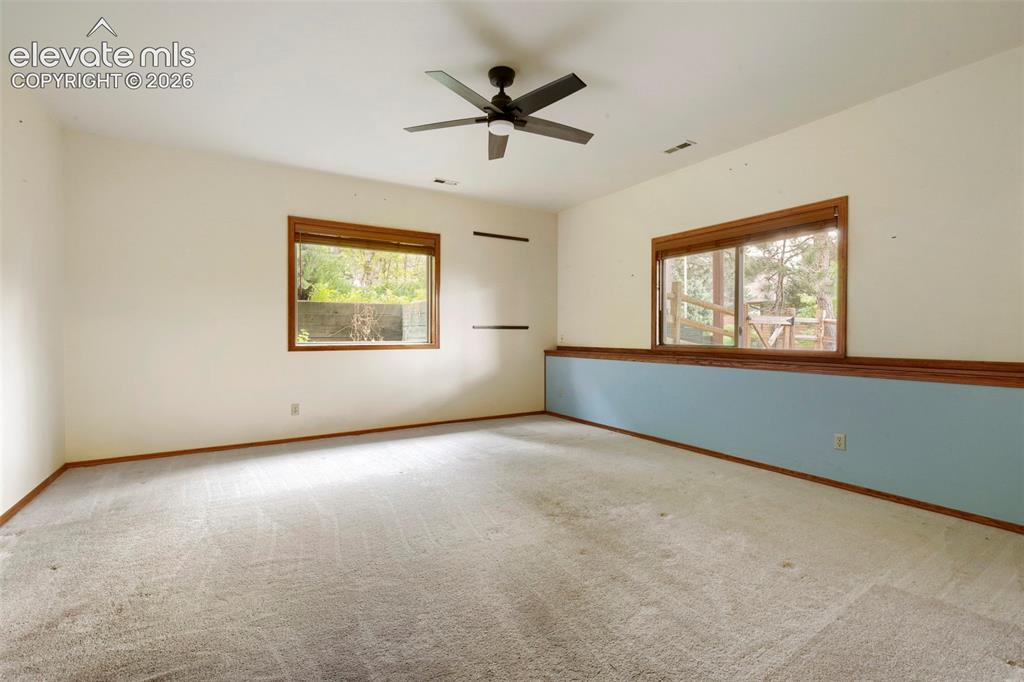 Image 33 of 49: Spacious Bedroom on the Lower Level