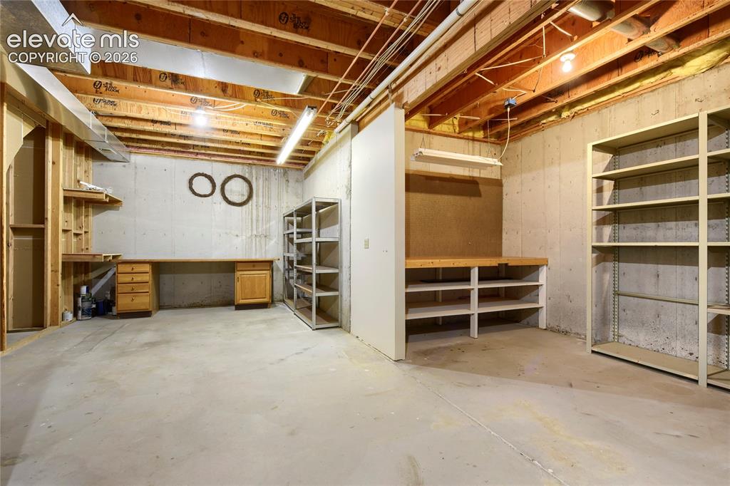 Image 38 of 49: Extended Workshop or Craft Room - Endless Storage!