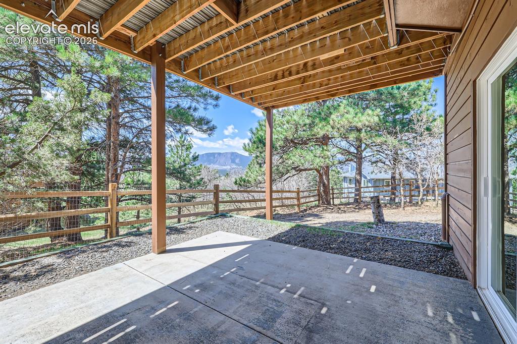 Image 39 of 49: Extended Side Yard from Walkout