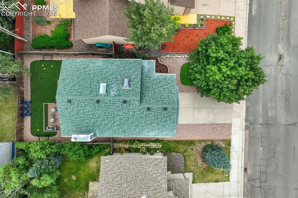 Image 34 of 36: Aerial view of property and surrounding area