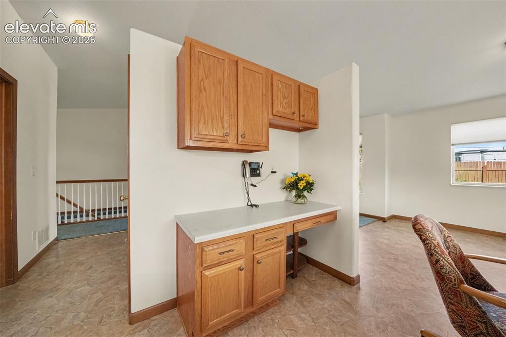 Image 13 of 33: Desk in Nook Area of Kitchen