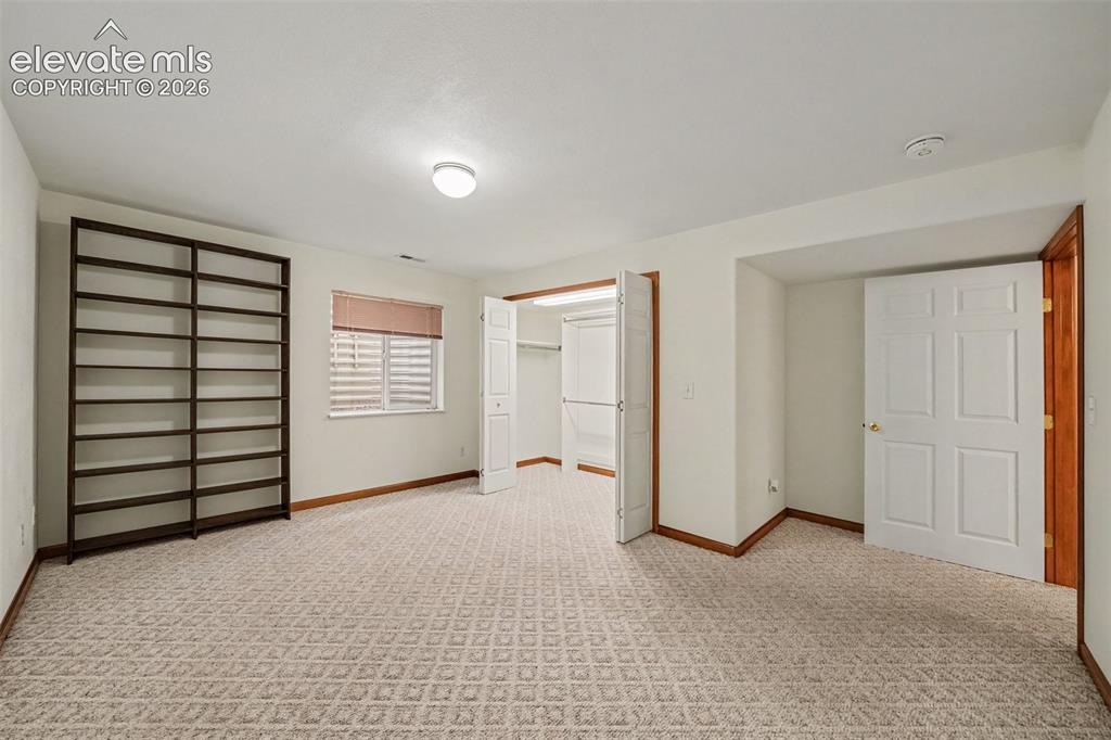 Image 24 of 33: Basement Bedroom - Huge Room - Deep Closet
