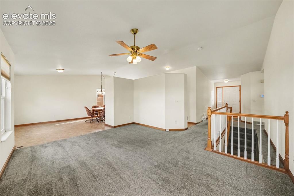 Image 4 of 33: Living Room Facing Dining Room Area