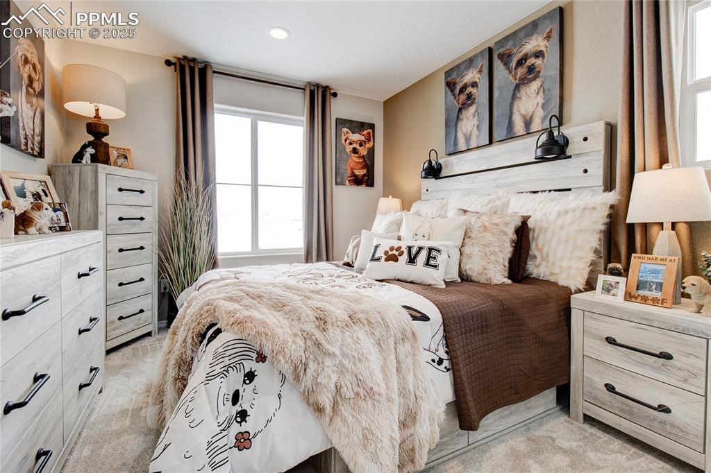Image 20 of 32: Bedroom featuring light carpet and recessed lighting