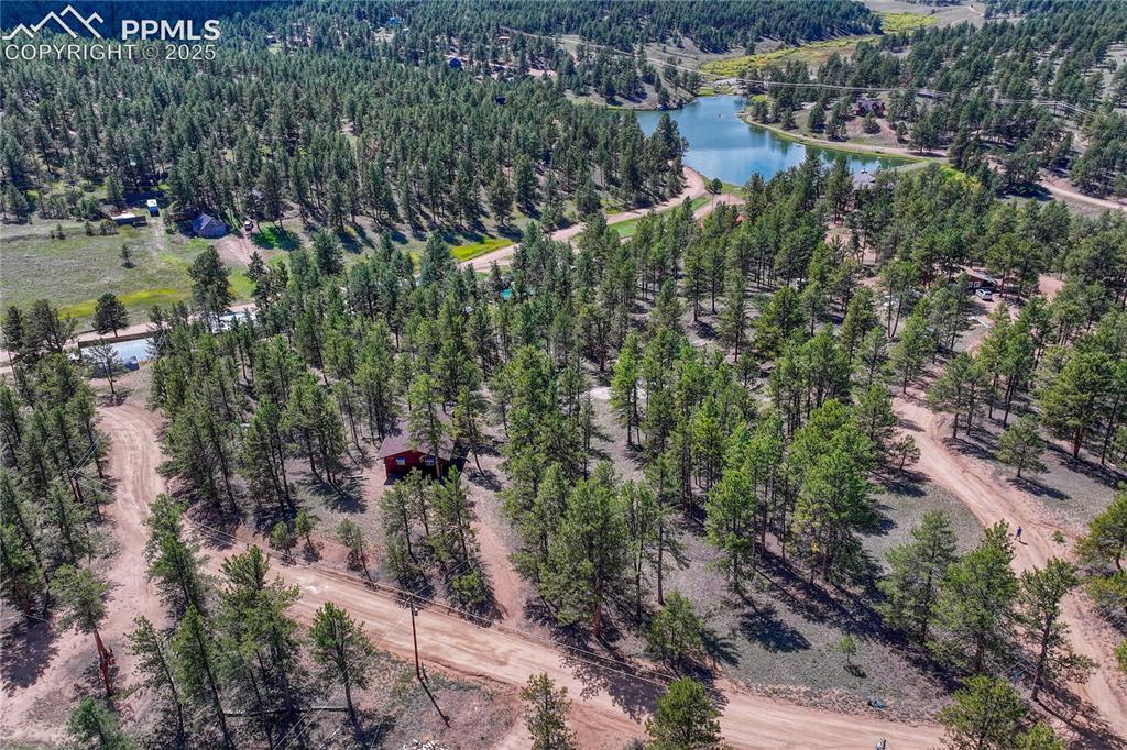 Image 36 of 41: aerial view of home near lake for fishing with membership in the sportsman