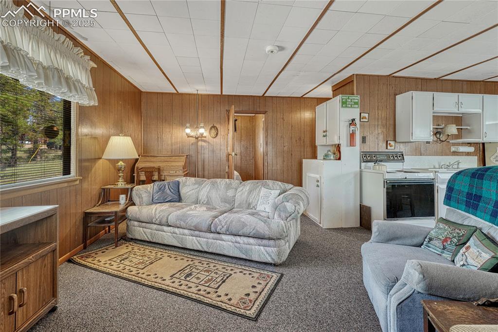 Image 8 of 41: Living room looking to bedrooms