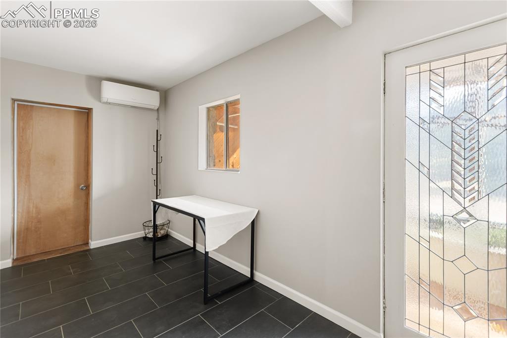Image 24 of 46: Gives access to the garden sunroom and garage!