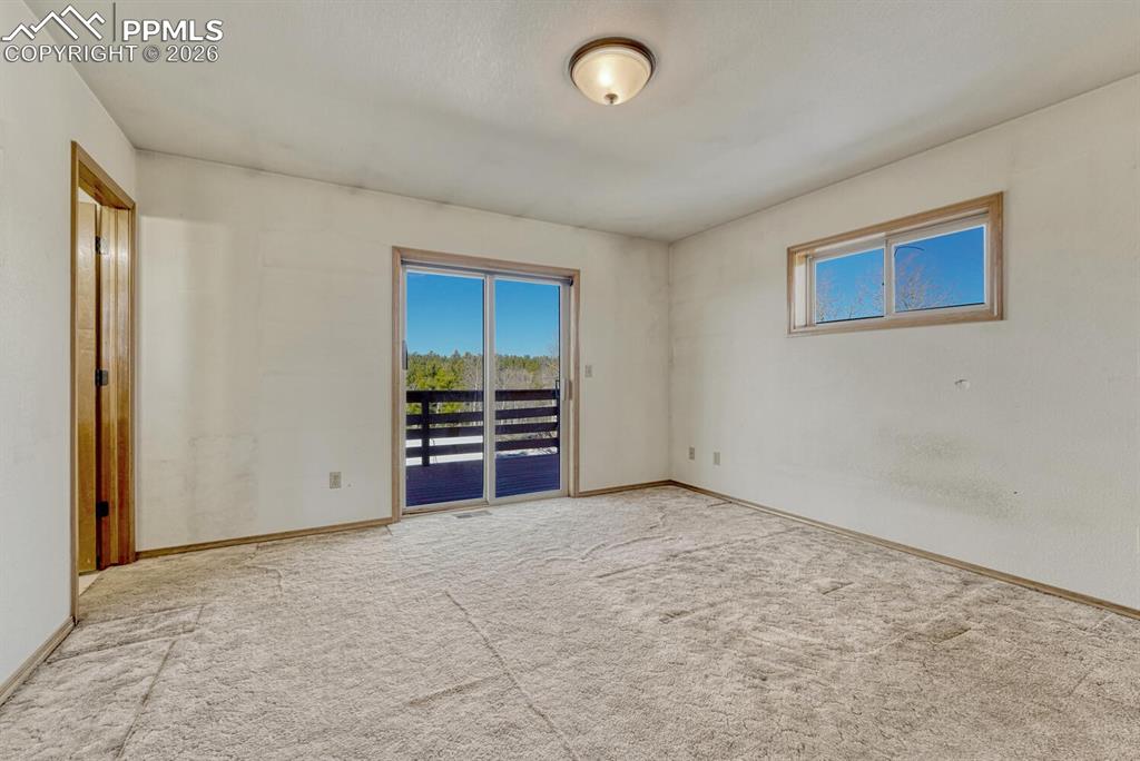 Image 27 of 50: (Main Level) Primary Bedroom.