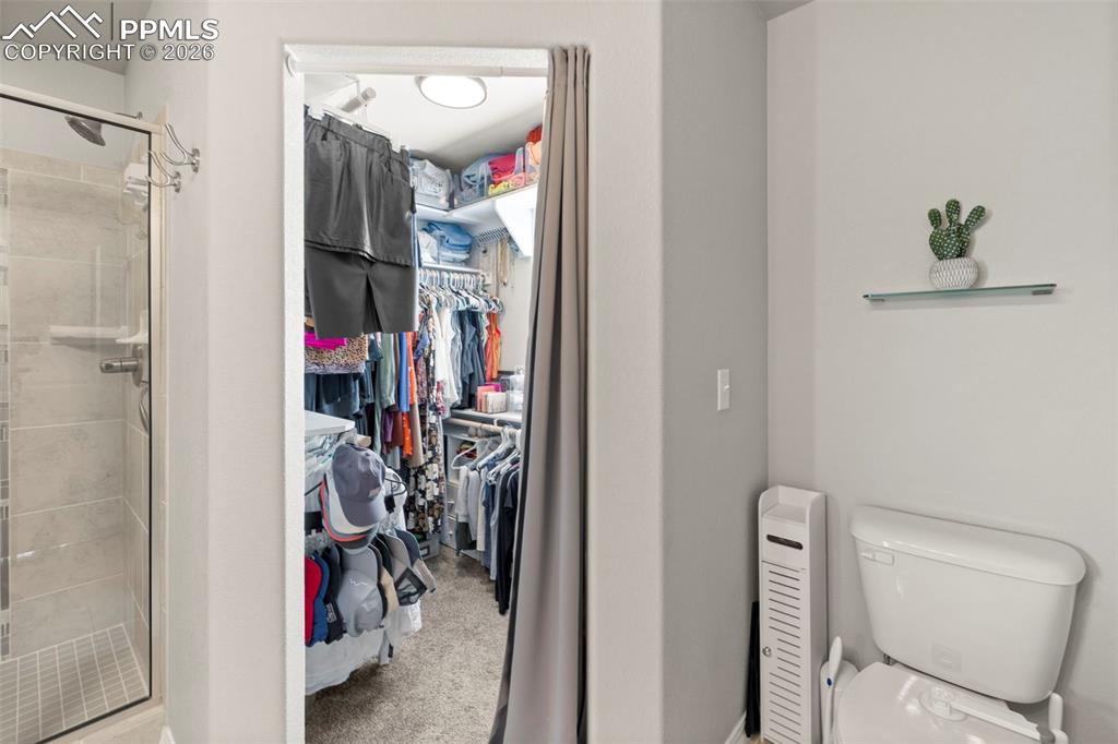 Image 22 of 50: Master closet was professionally redone with new shelving, etc.