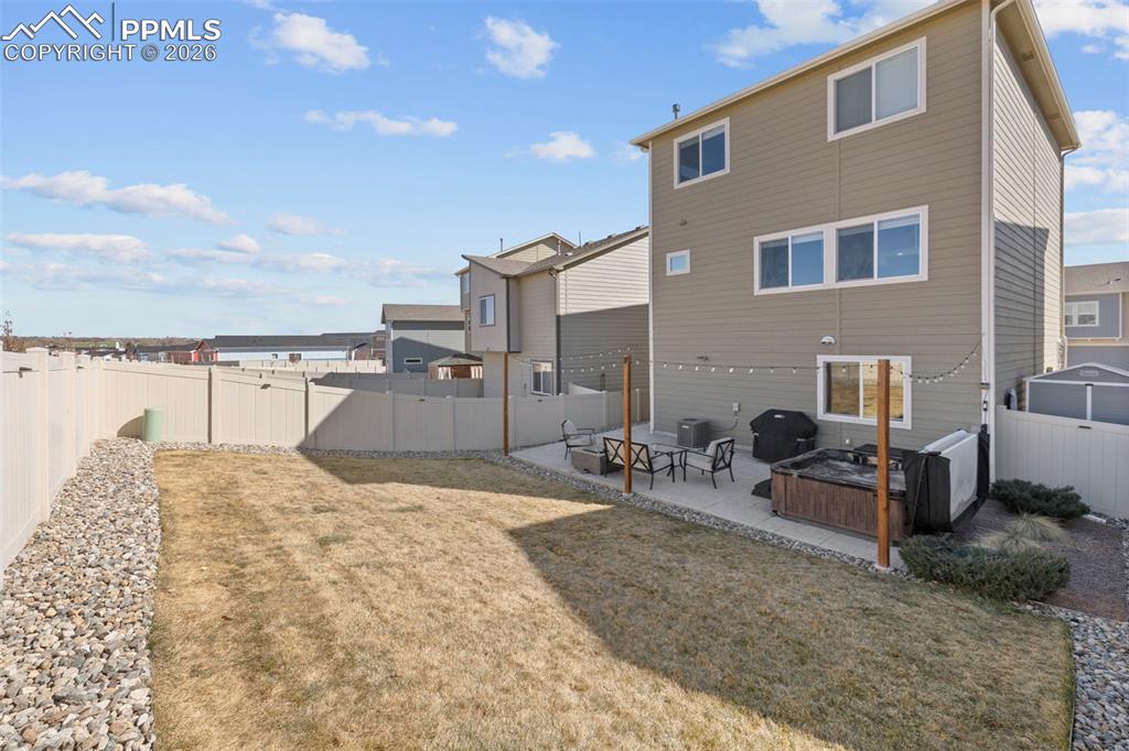 Image 37 of 50: Large stamped concrete patio and was professionally sealed in 2025 for long