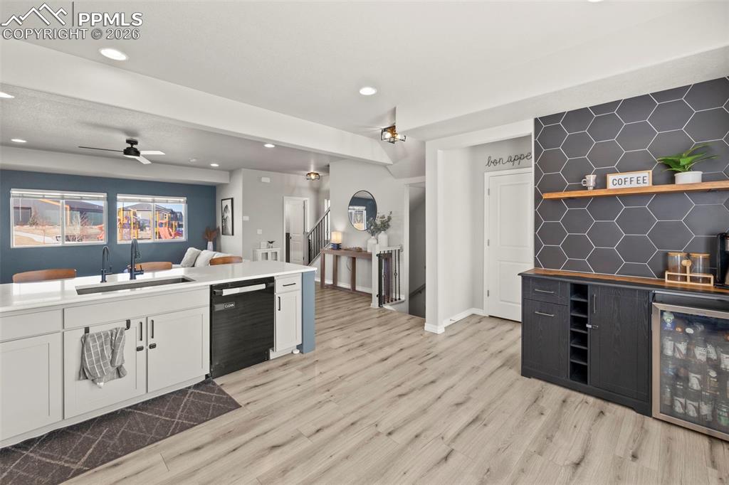 Image 8 of 50: Custom coffee/mini bar in the kitchen