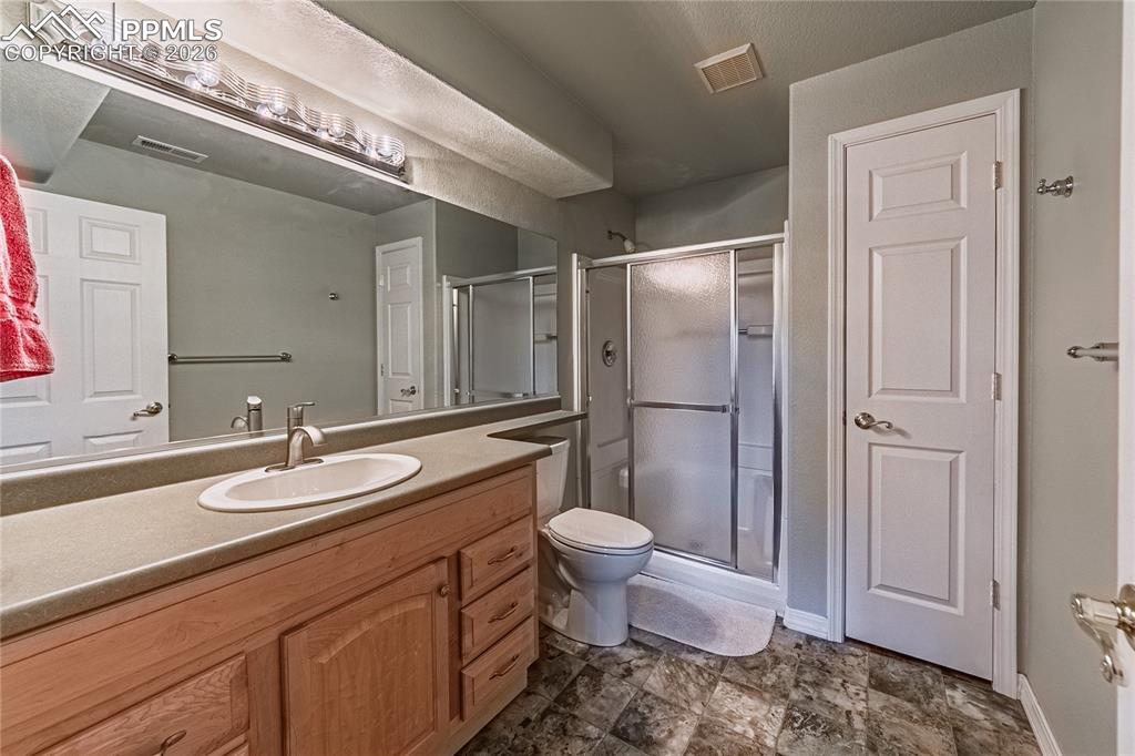 Image 22 of 33: Basement bath...