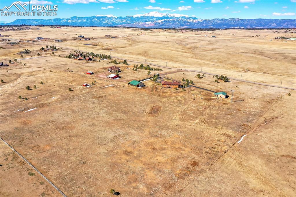 Caption: Aerial view with a rural view and a mountain view