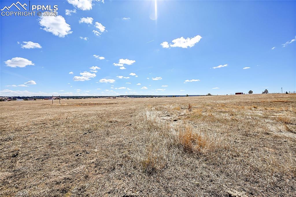 Image 19 of 32: View of local wilderness featuring a rural view