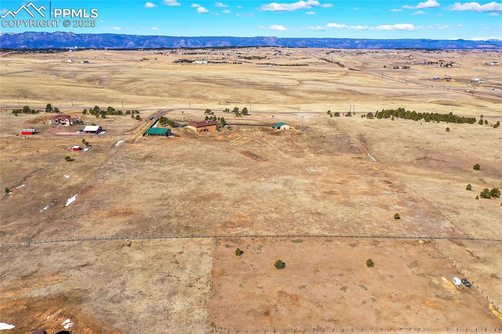 Image 23 of 32: Aerial view featuring a rural view and a mountain view