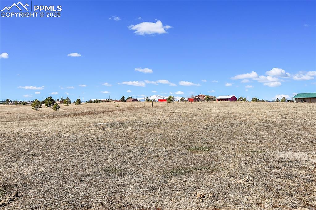 Image 29 of 32: View of yard with a rural view