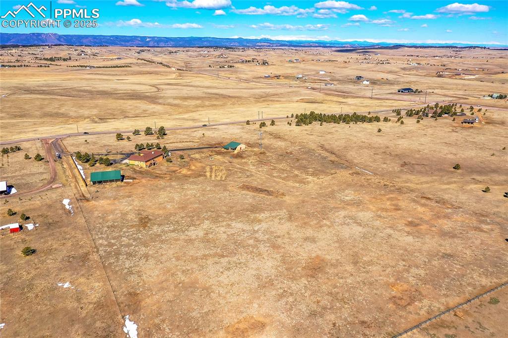 Image 4 of 32: Birds eye view of property featuring a mountain view, a rural view, and vie
