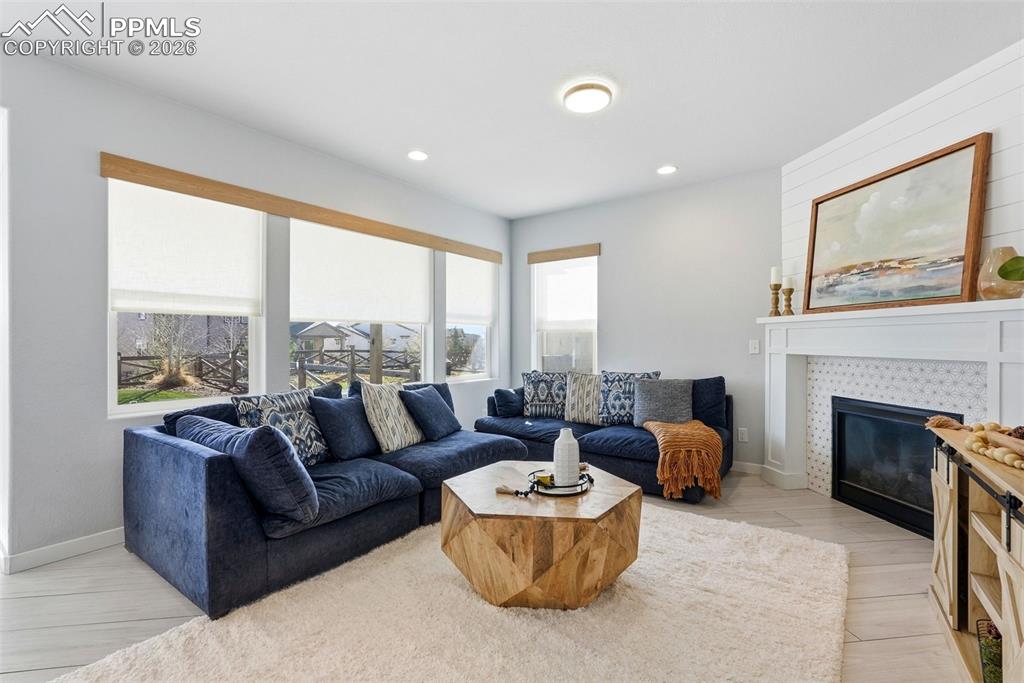 Image 10 of 33: living room with gas fire place