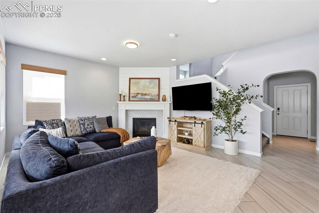 Image 11 of 33: livignroom featuring view to entry way