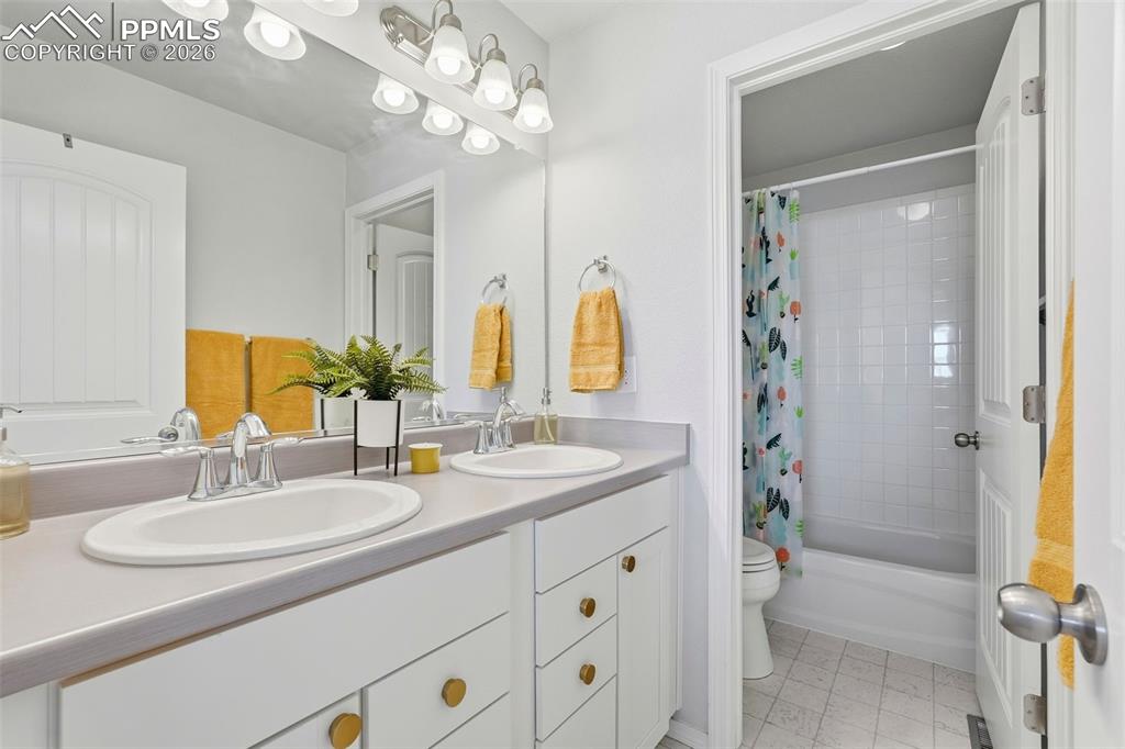 Image 16 of 33: full bath upper- next to bedroom 2 upper