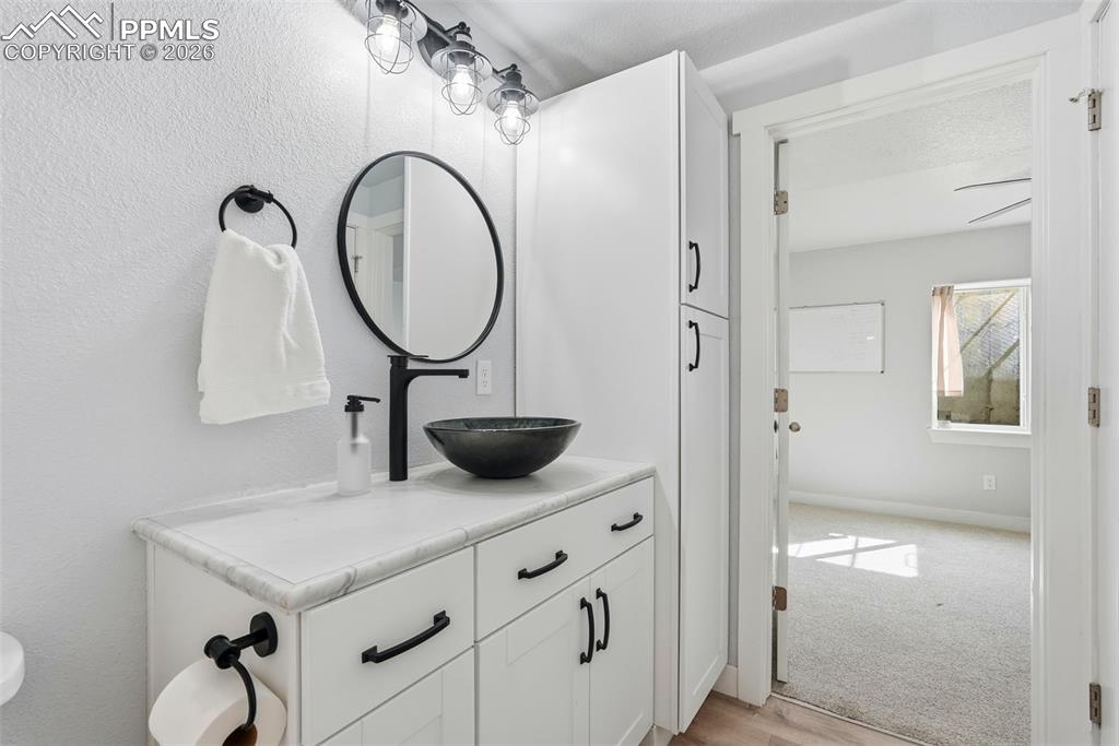 Image 27 of 33: bathroom in basement