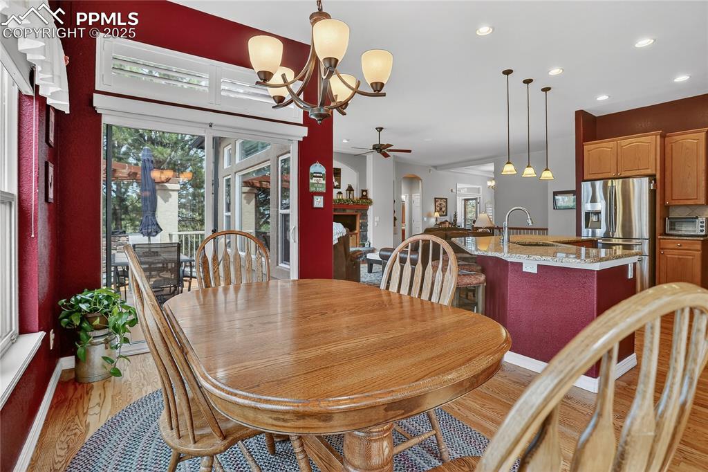 Image 14 of 45: Eat-in kitchen plus counter seating gives plenty of dining options.