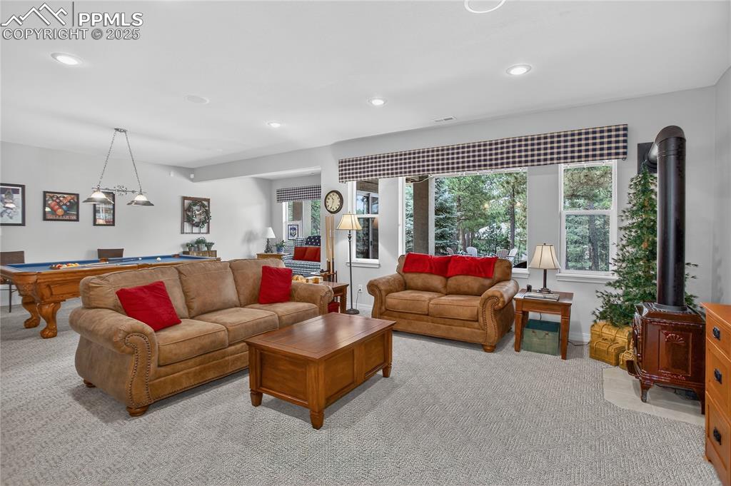 Image 26 of 45: Lower level family room