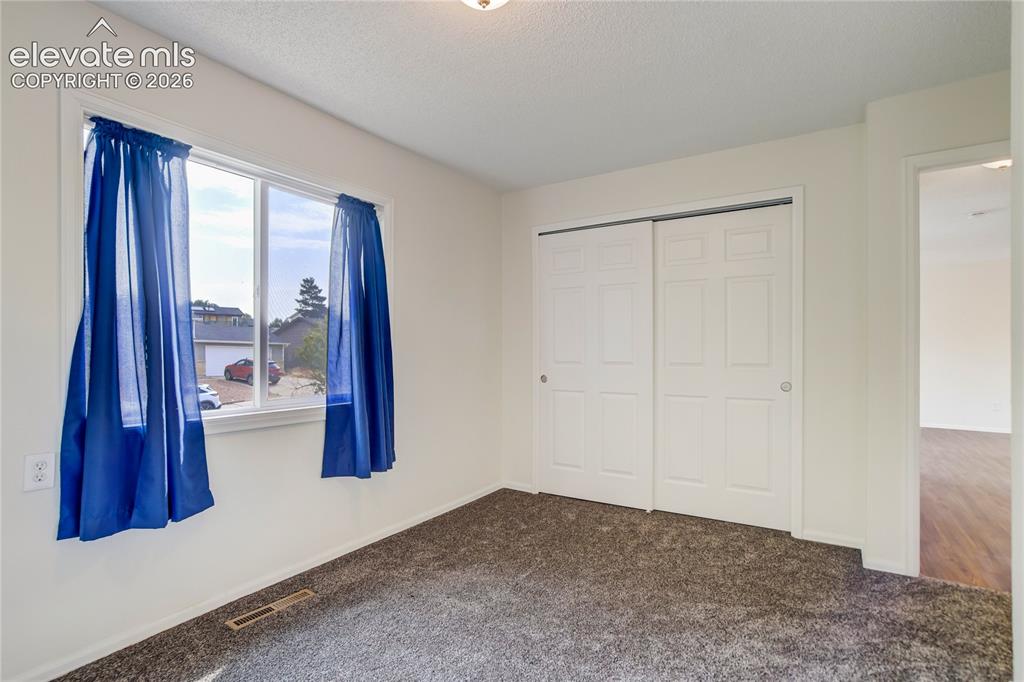 Image 18 of 48: Bedroom