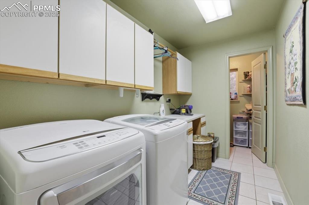 Image 21 of 49: Main floor laundry