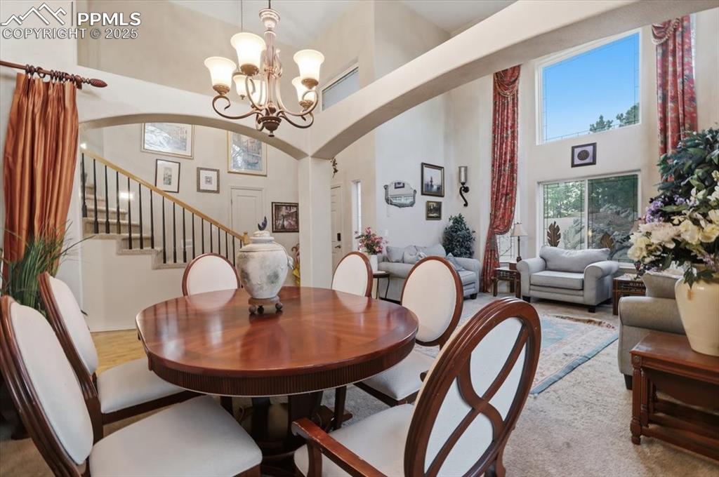 Image 3 of 49: Elegant formal dining room