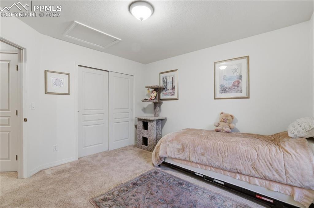 Image 35 of 49: Third upstairs bedroom